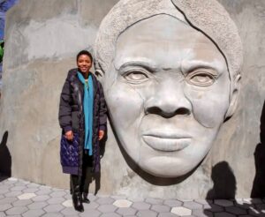Designer and architect Nina Cooke John and the face of the new Tubman memorial.